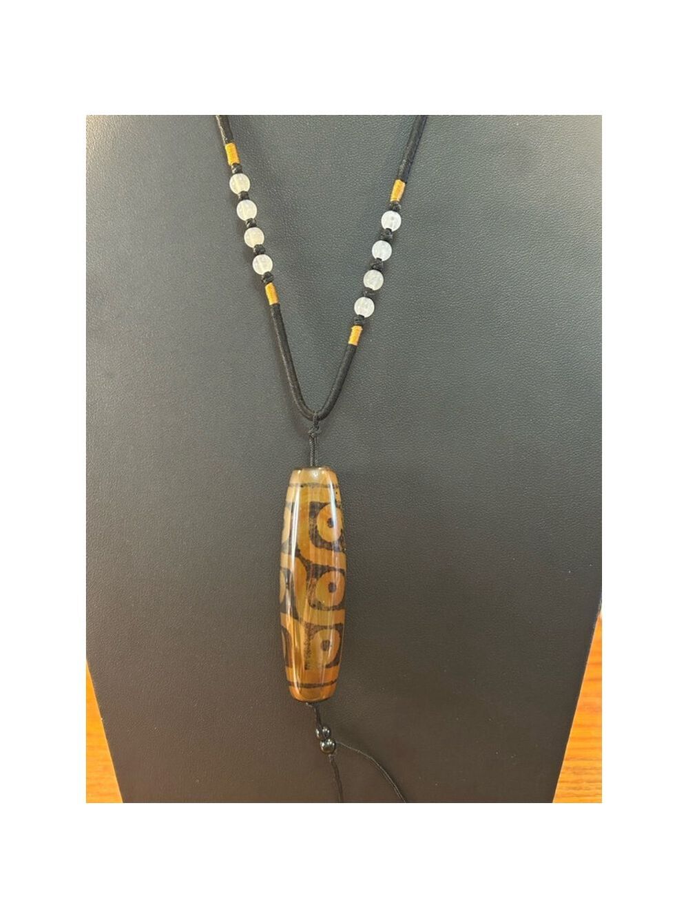 Boho corded necklace with tribal influenced glass pendant